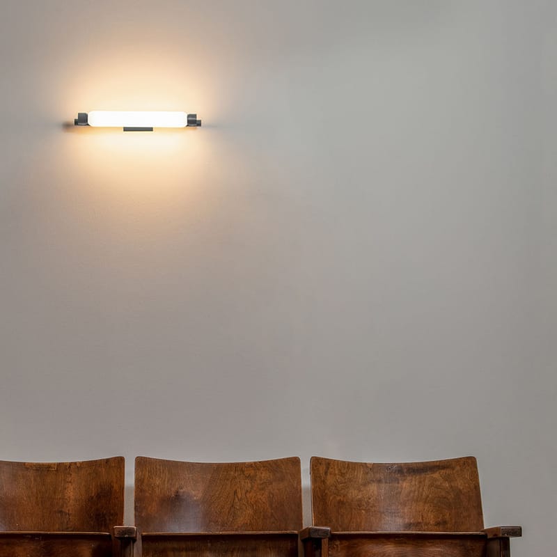 Black metal store wall lamp