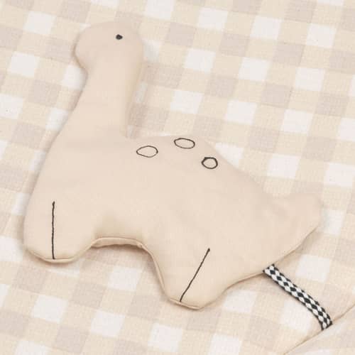 Spielteppich Playground textil beige / Ø 100 cm - NOBODINOZ - Dinosaurier / Vichy beige - Organische Baumwolle, Polyester (OEKO-TEX® zertifiziert)