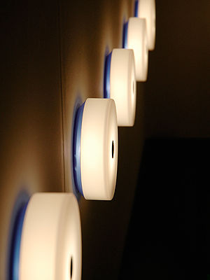 Flos Button Wall light - white | Made In Design UK