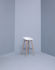 About a stool Bar stool - H 75 cm - Plastic & wood legs by Hay